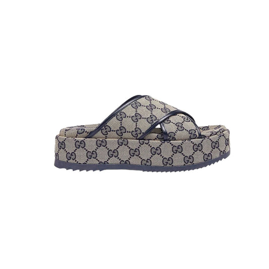 GUCCI SUPREME PLATFORM SLIPPERS